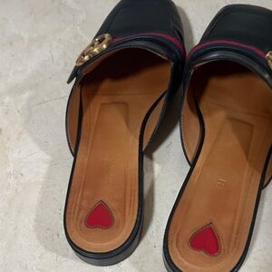 Gucci Elegant Black Women's Mules with Gold Accent